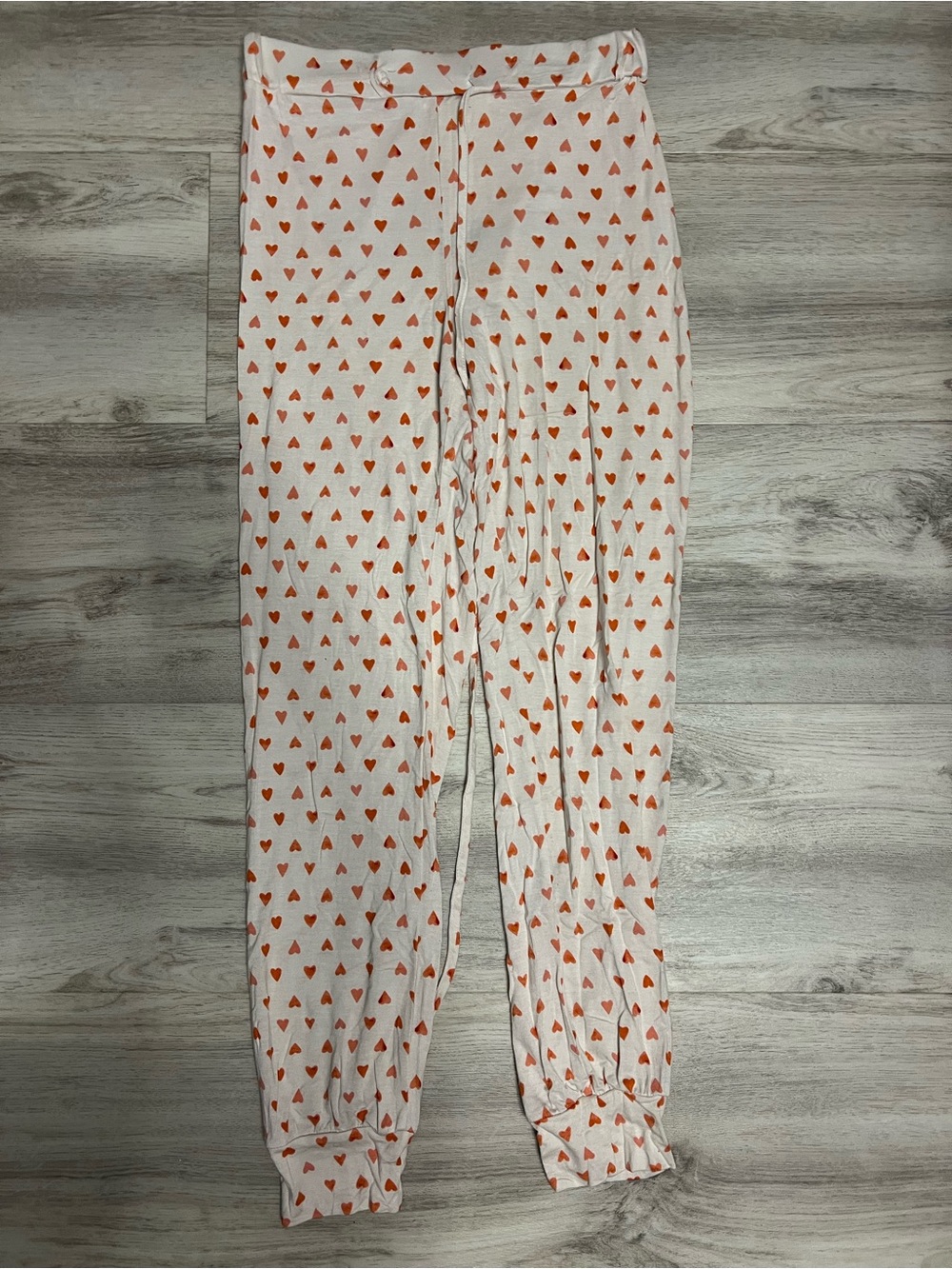 White Jogger Pants with Orange Heart Print